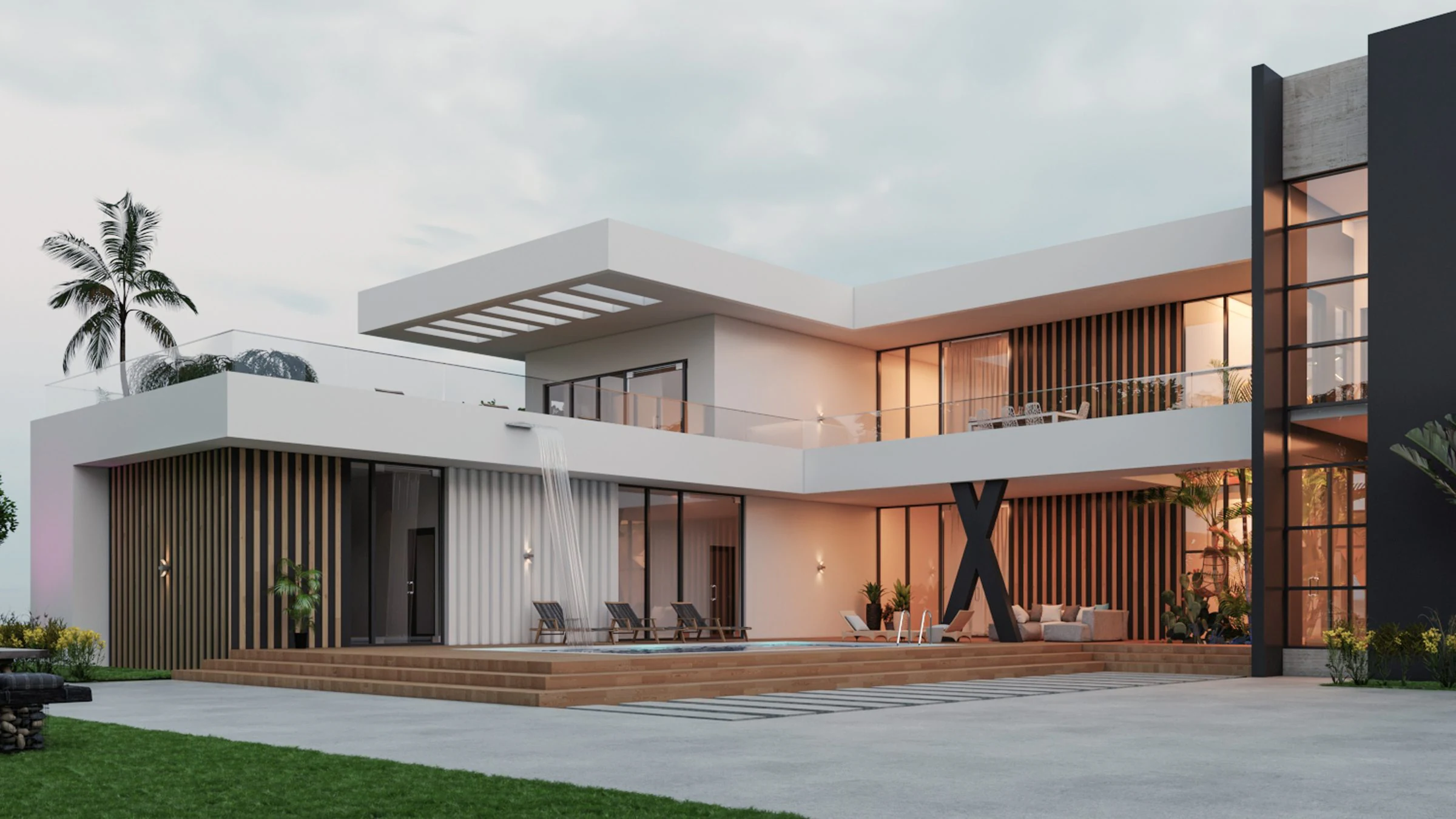 Triplex SE — vue d'angle de la façade, terrasses de bois et piscine à cascade, à la tombée du jour